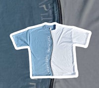 a t - shirt with a blue and white design on it