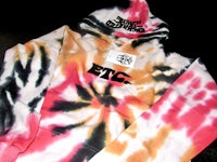 a tie dye hoodie with the word evc on it